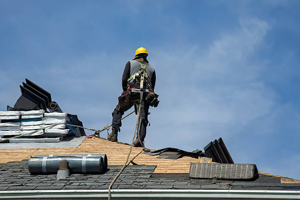 Professional Roof Replacement technician working in Faribault, MN